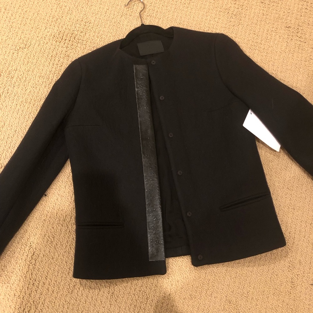 Prada wool jacket with silk lining. Size small.